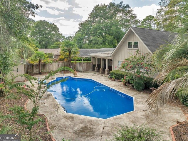 view of pool featuring a patio area