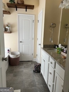 bathroom featuring vanity and tile patterned flooring