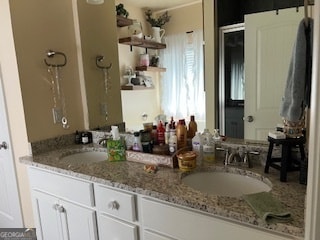 bathroom featuring double sink vanity