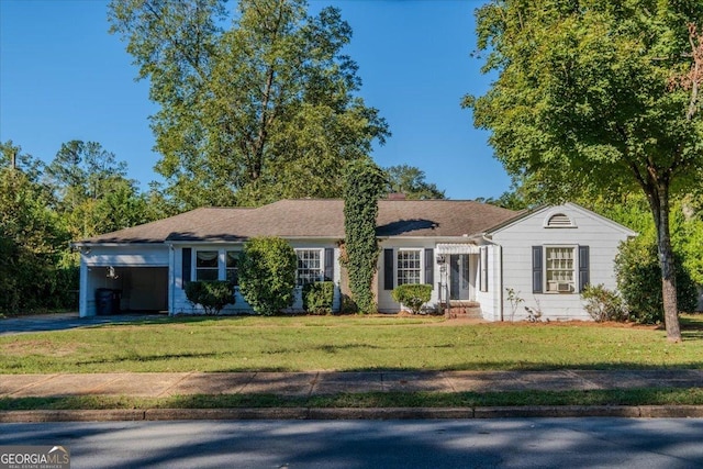 ranch-style home featuring an attached carport and a front yard