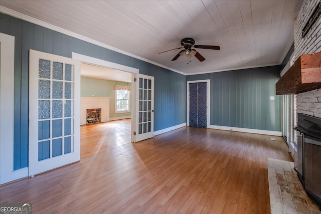 unfurnished living room with crown molding, wooden ceiling, light wood-type flooring, and ceiling fan