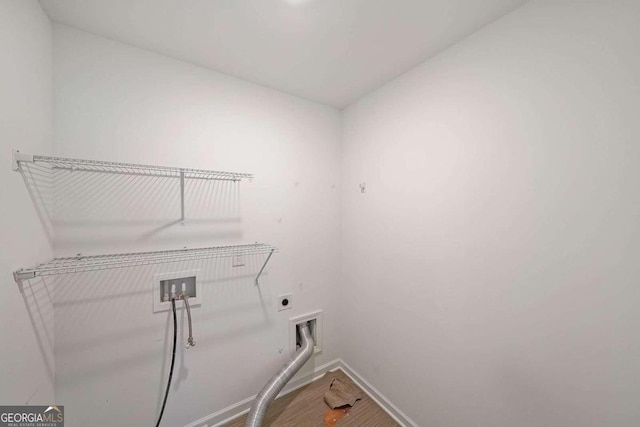 washroom featuring washer hookup, hookup for an electric dryer, wood finished floors, laundry area, and baseboards