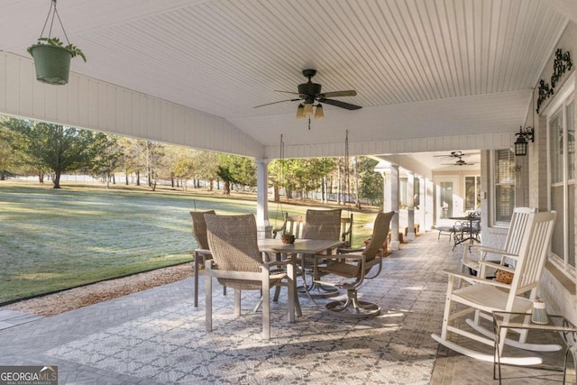 view of patio featuring ceiling fan