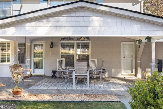 rear view of house featuring a patio area