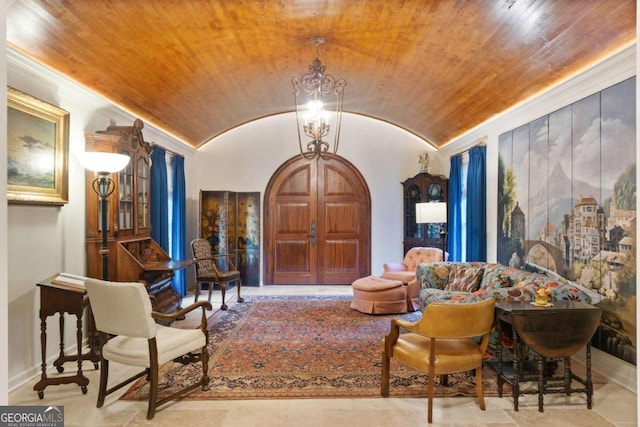 tiled living room with lofted ceiling, wooden ceiling, and a chandelier