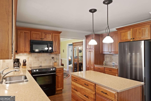 kitchen featuring dark hardwood / wood-style flooring, backsplash, black appliances, and sink