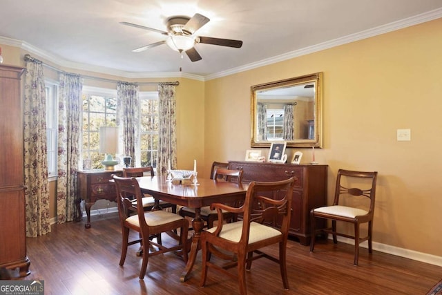 dining space with ceiling fan, ornamental molding, and dark hardwood / wood-style floors