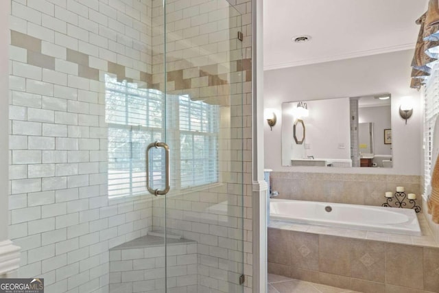 bathroom featuring tile patterned flooring, separate shower and tub, and ornamental molding