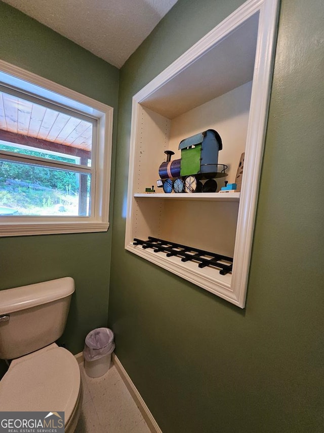 bathroom featuring toilet