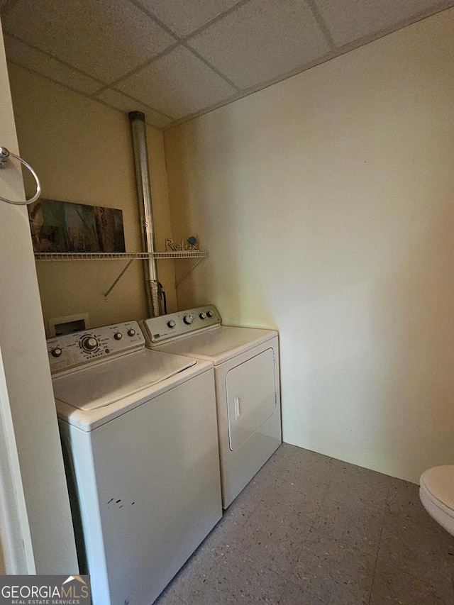 laundry room featuring washer and clothes dryer