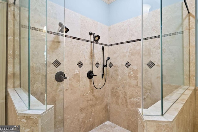 bathroom featuring a tile shower