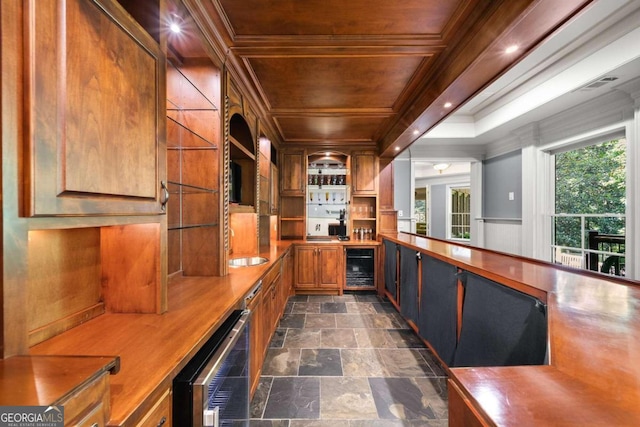 bar featuring sink, crown molding, wood ceiling, and wine cooler