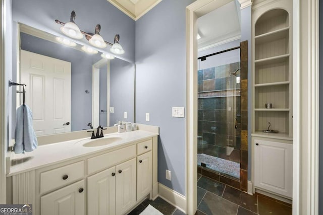 bathroom with vanity, a shower with door, and ornamental molding