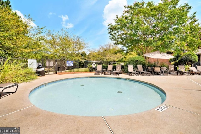 view of pool with a patio