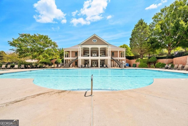 view of swimming pool featuring a patio