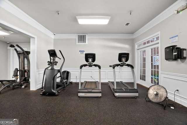 exercise room with crown molding