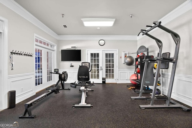 exercise room with french doors and ornamental molding