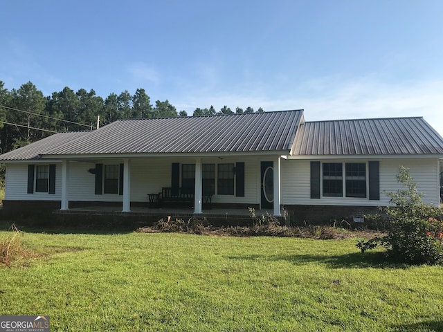 single story home featuring a front yard