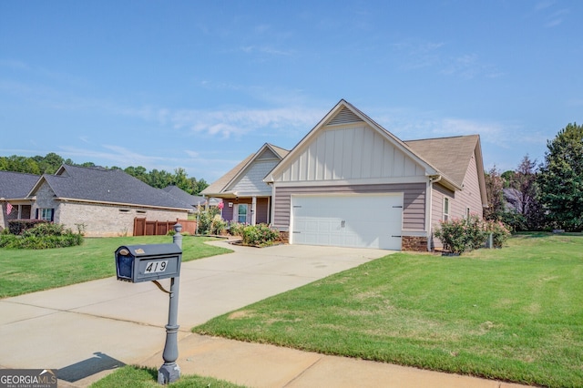 view of front of home with a front lawn and a garage