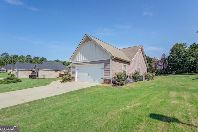 view of property exterior featuring a garage and a yard