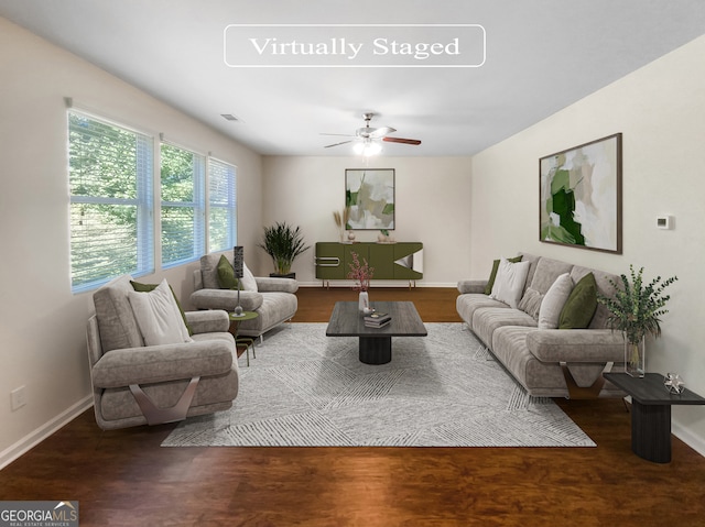 living room with ceiling fan and wood-type flooring