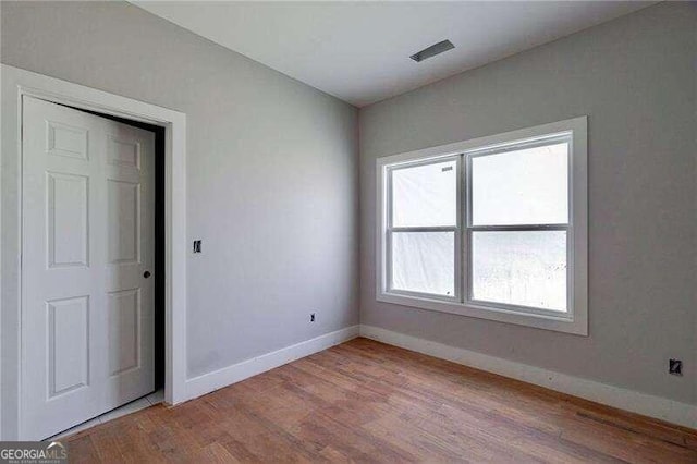 empty room featuring light hardwood / wood-style floors