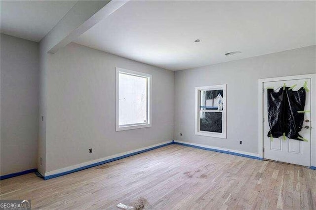 unfurnished bedroom with light hardwood / wood-style floors