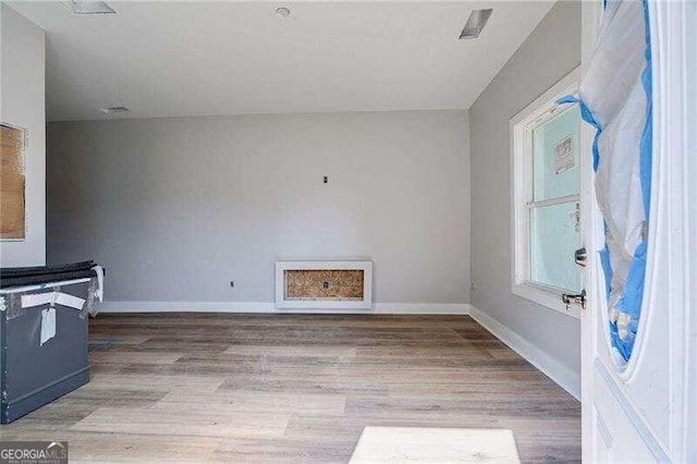 interior space with hardwood / wood-style floors