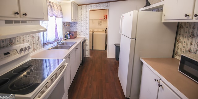 kitchen with white cabinets, separate washer and dryer, white appliances, dark hardwood / wood-style flooring, and range hood