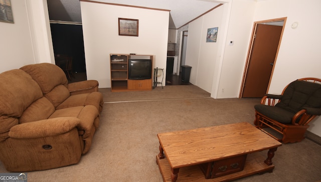 carpeted living room featuring lofted ceiling