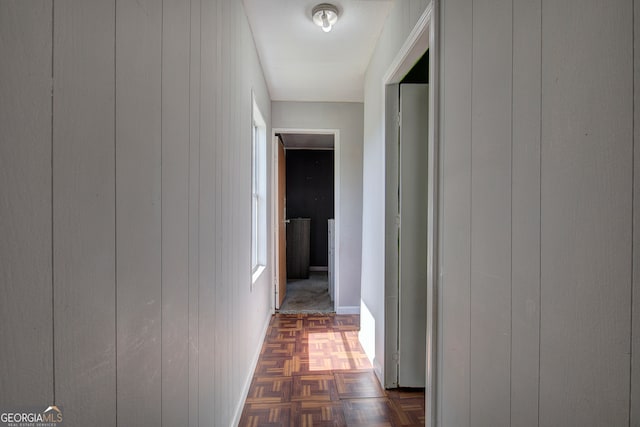 hall featuring dark parquet floors