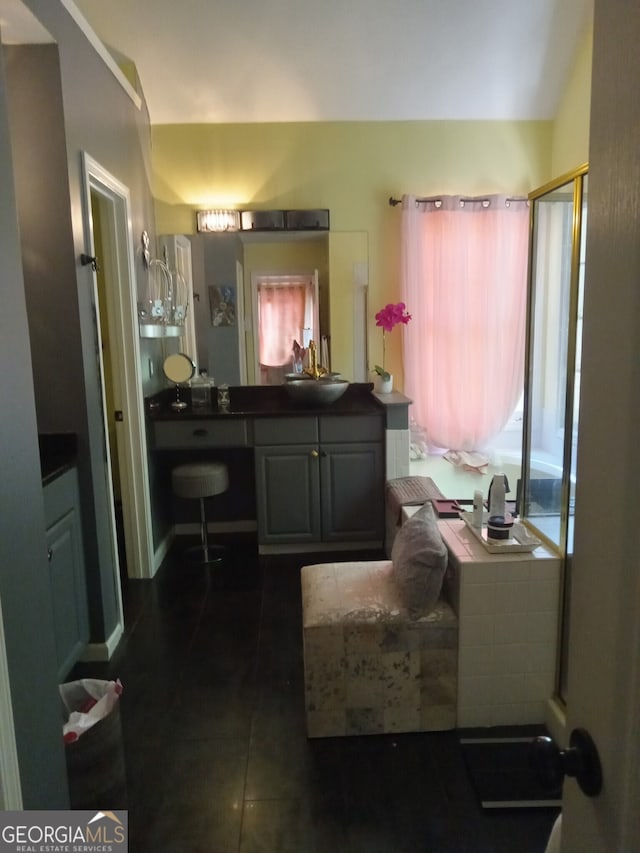 bathroom featuring a wealth of natural light and vanity