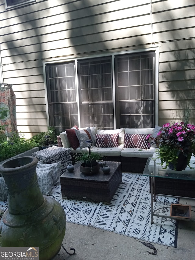 exterior space with an outdoor hangout area