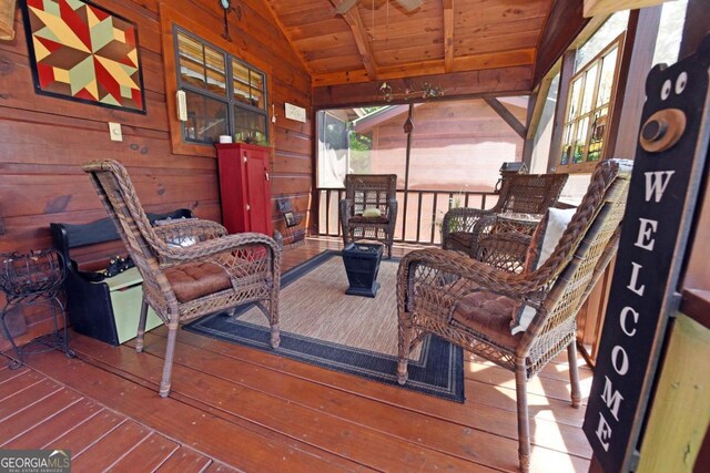 wooden deck featuring outdoor lounge area