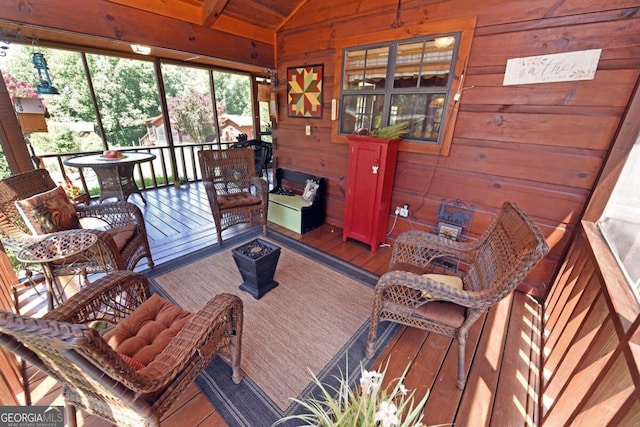 sunroom / solarium with lofted ceiling