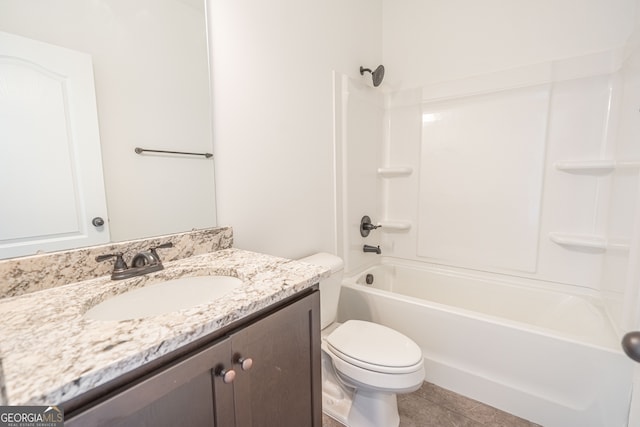 full bathroom featuring bathing tub / shower combination, vanity, toilet, and tile patterned flooring