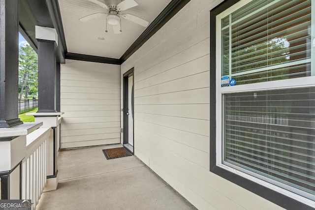 exterior space featuring covered porch and ceiling fan