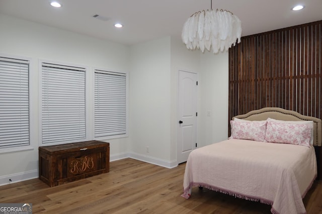 bedroom featuring hardwood / wood-style flooring