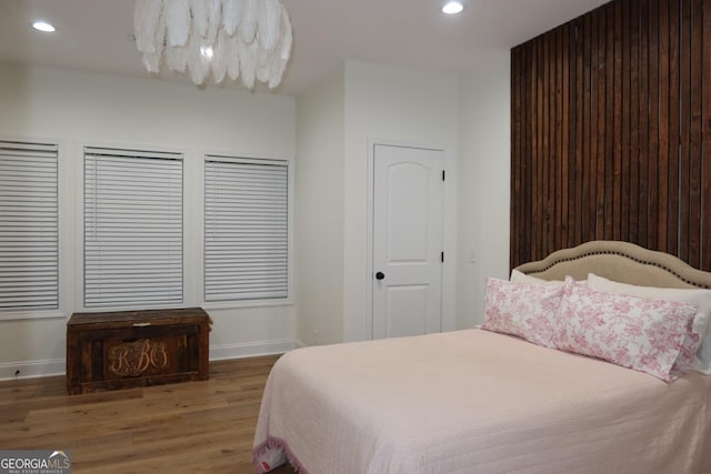 bedroom featuring hardwood / wood-style floors