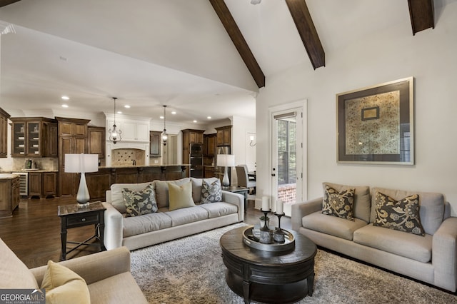 living room with beam ceiling, high vaulted ceiling, and dark hardwood / wood-style flooring