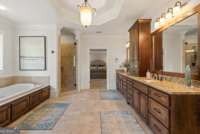 bathroom with vanity, a tray ceiling, ornamental molding, tile patterned floors, and shower with separate bathtub