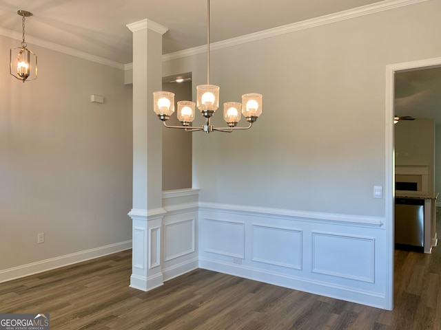 unfurnished dining area featuring ornamental molding, dark wood-type flooring, and decorative columns