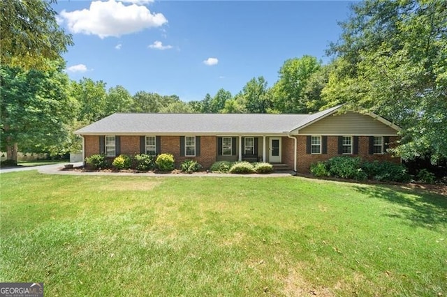 ranch-style home with a front yard