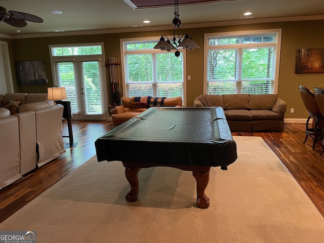 playroom with dark hardwood / wood-style floors, ceiling fan, french doors, pool table, and ornamental molding