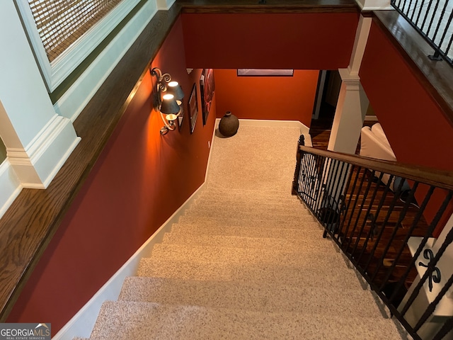 stairway with carpet floors