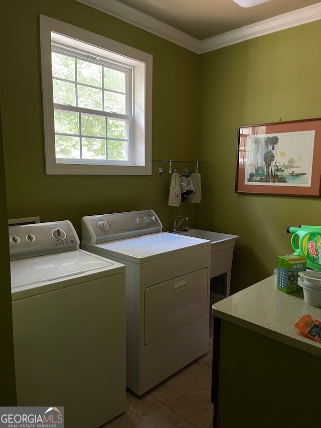 washroom featuring ornamental molding, tile patterned floors, and independent washer and dryer