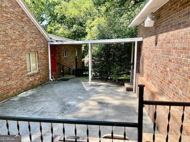 view of patio / terrace featuring a carport