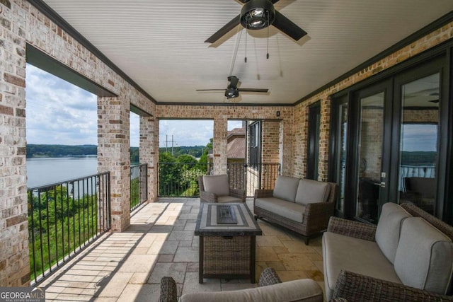 2771 Point Overlook, Gainesville, GA 30501 - view of patio featuring an outdoor hangout area, a balcony, ceiling fan, and a water view