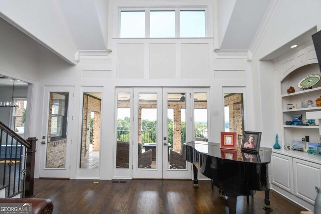 2771 Point Overlook, Gainesville, GA 30501 - entryway with crown molding, dark hardwood / wood-style floors, high vaulted ceiling, and french doors