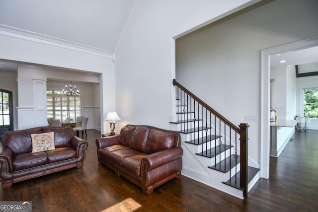 2771 Point Overlook, Gainesville, GA 30501 - living room with ornamental molding, dark hardwood / wood-style floors, and a chandelier